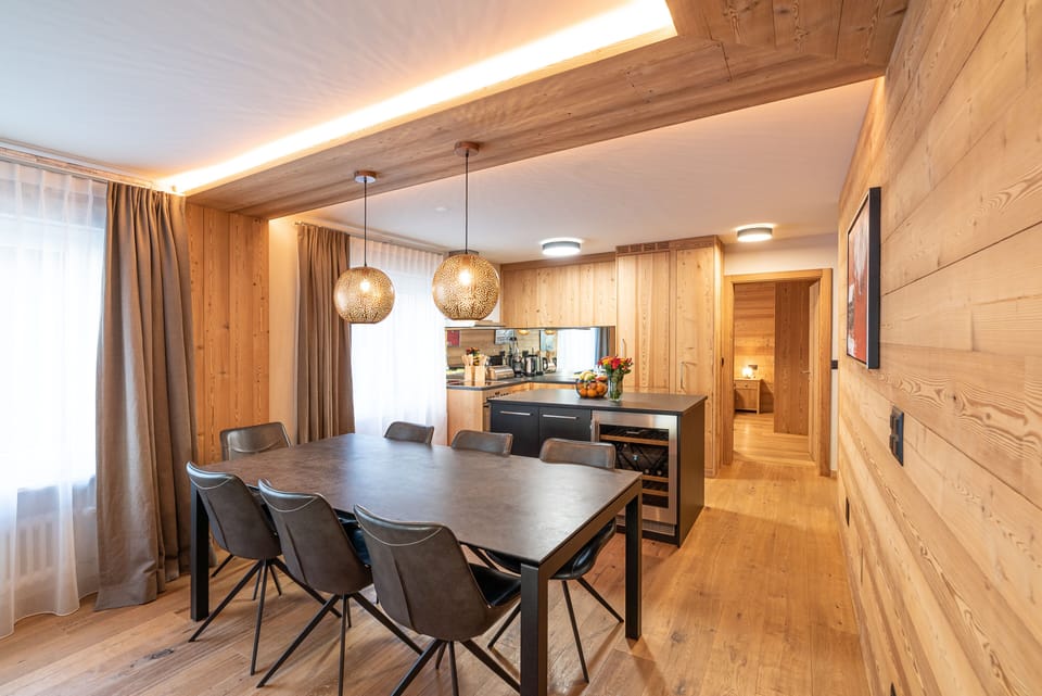 Two-Bedroom Apartment with Matterhorn View (3rd floor) | Living area | 108-inch flat-screen TV with cable channels, TV, heated floors