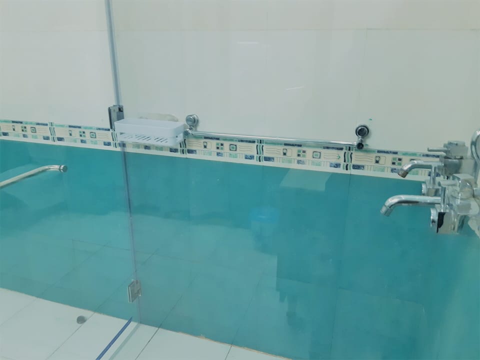Bathroom No. 1 of two BHK Executive Suite SA5. It is also, 1BHK Apartment SA3.