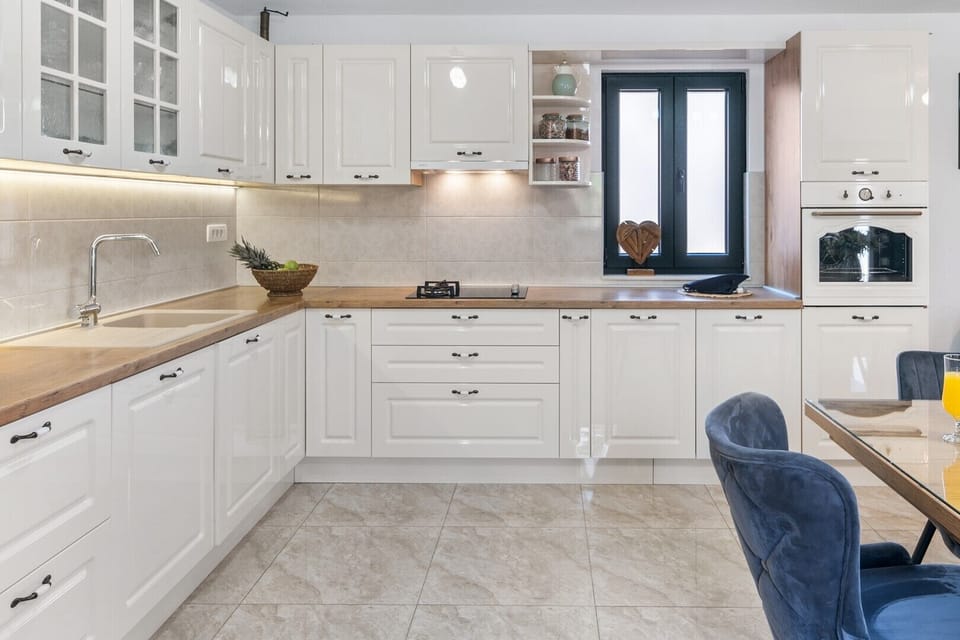 A fully equipped kitchen with all the amenities you need for your cooking expertise.