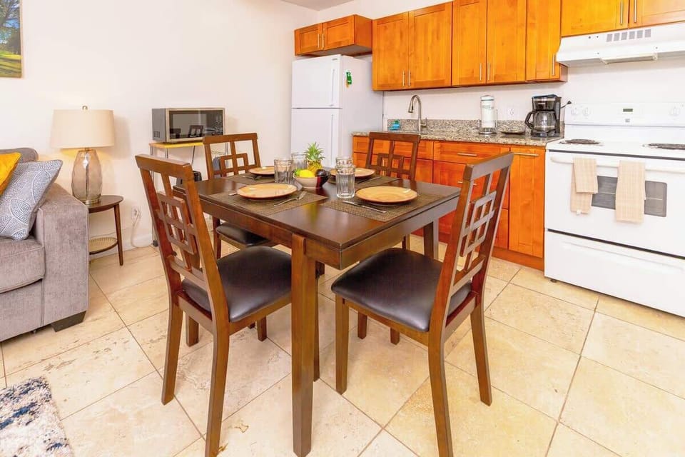 Dining table and chairs for 4 people and a fully equipped kitchen with full-size appliances