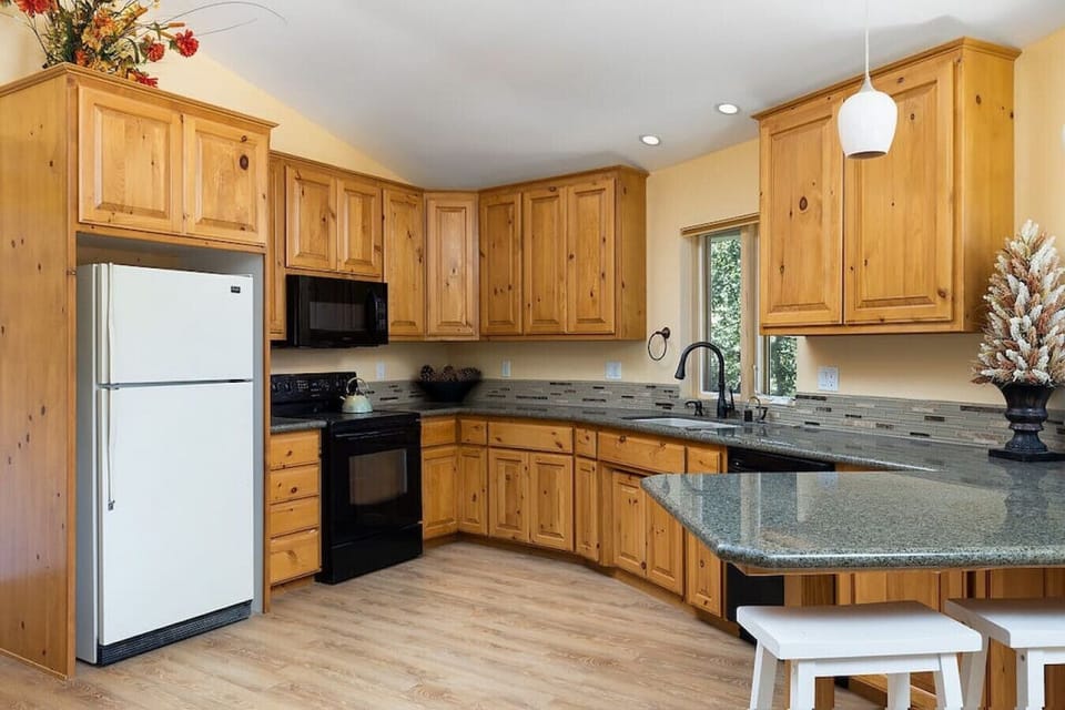 Fully functional and well stocked kitchen with plenty of counter space.