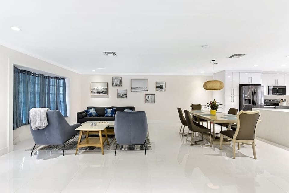 Living and dining area overview showcasing the home’s airy, spacious design.