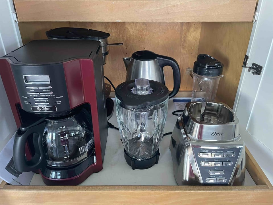 Pantry with coffee maker, filters and blender