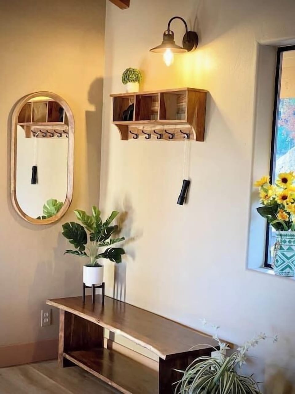 Entry way has 2 mirrors, a bench, coat rack and a closet for your jackets and coats.