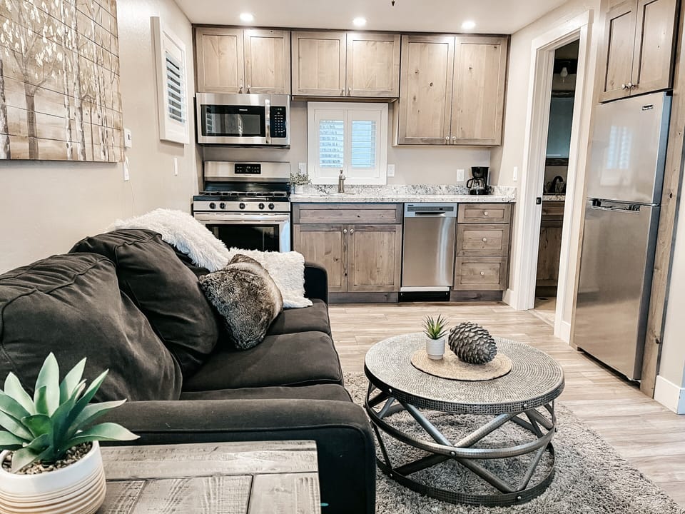 Family room and kitchen. Bathroom to the right of kitchen. 