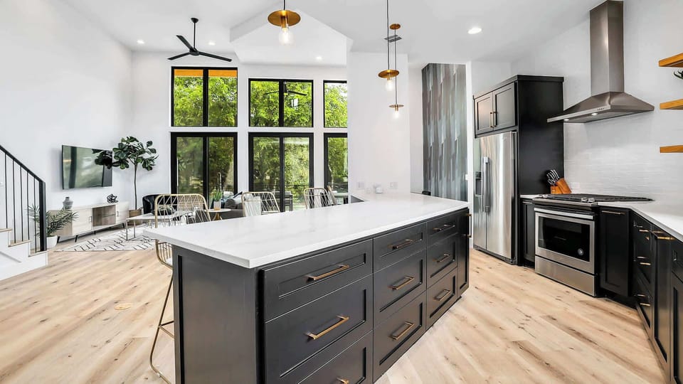 Kitchen Island with seating for 6 right near the dining table that also seats 6