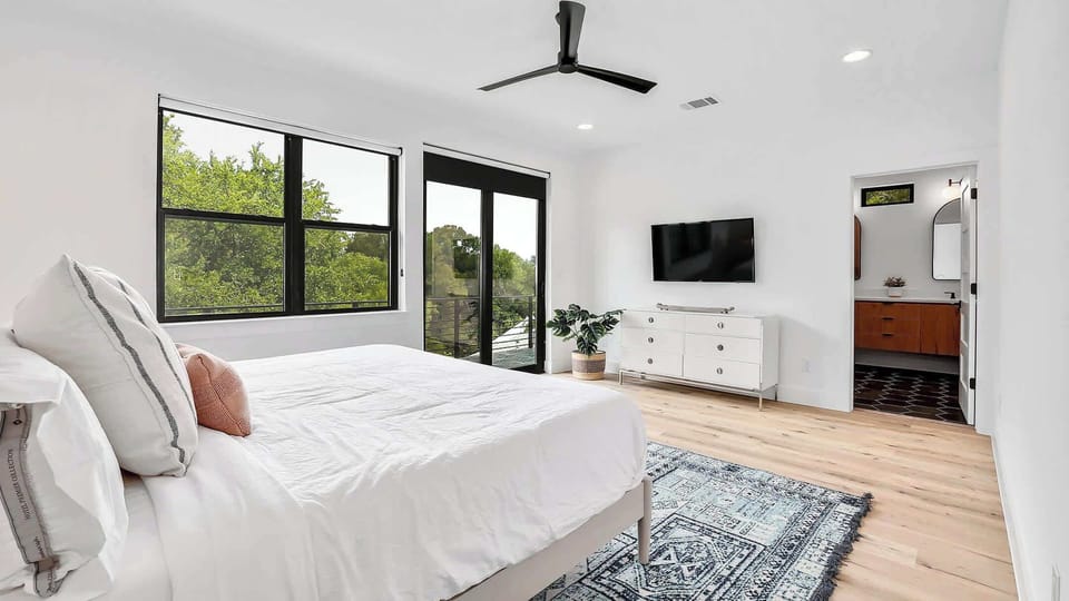 Bedroom 4- The Primary Bedroom has a King sized bed and a private patio