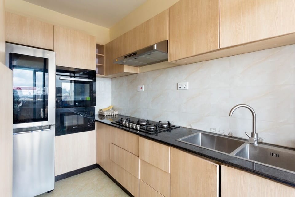Apartment | Private kitchen | Full-size fridge, microwave, coffee/tea maker, cookware/dishes/utensils