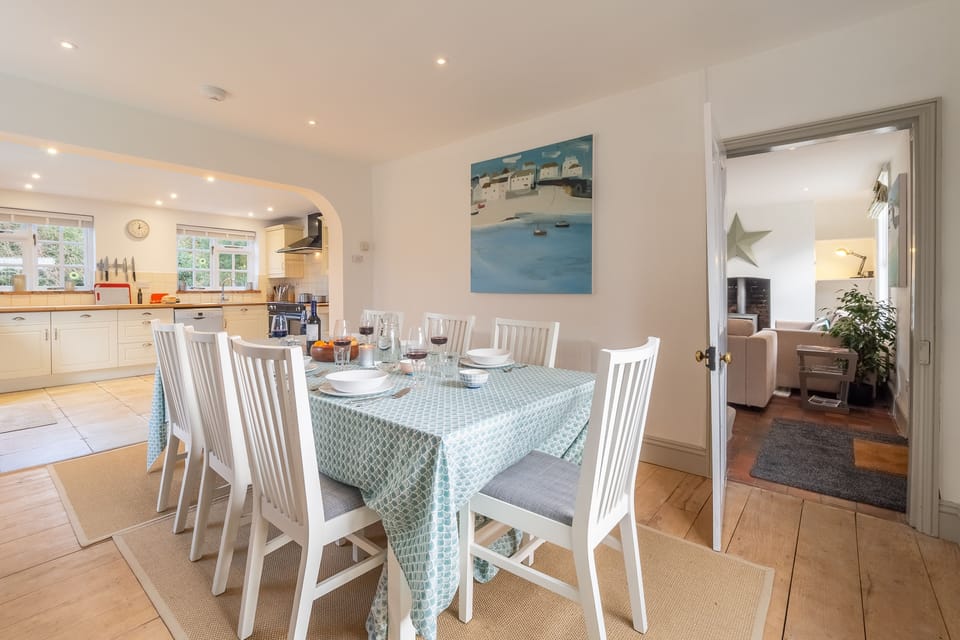 Ground floor: The dining room has a door to the sitting room