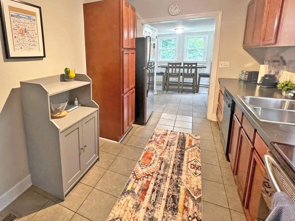 Prepare a delicious meal for your loved ones with the help of a fully equipped kitchen that includes a wide range of items such as pots, pans, plates, bowls, glasses, and more.