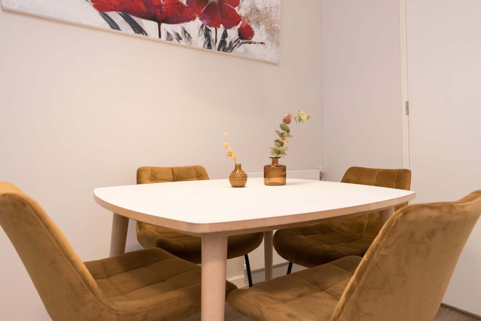 Cozy dining area for four guests—ideal for breakfast or a homemade dinner.