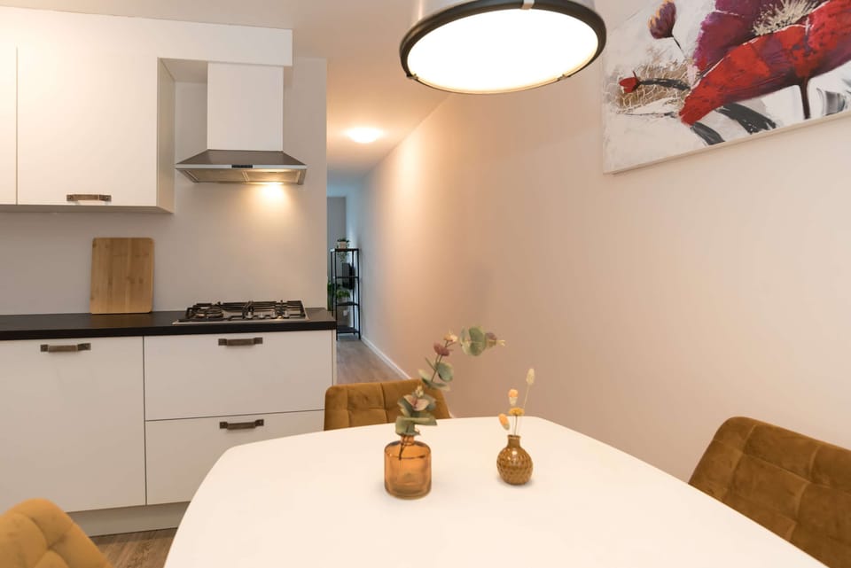Cozy dining area for four guests—ideal for breakfast or a homemade dinner.