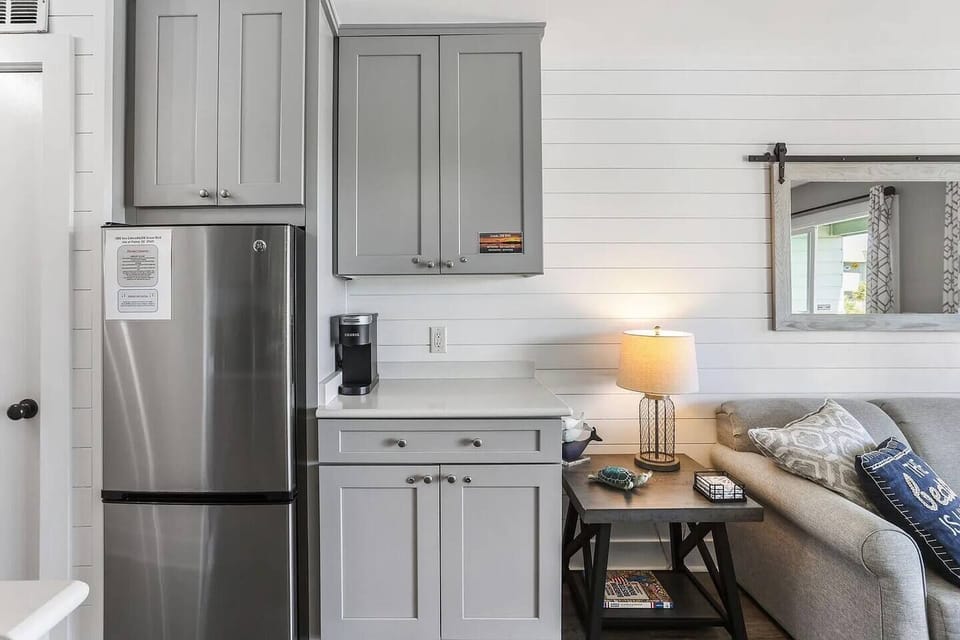Kitchen with stainless steel appliances Sea Cabin 208A, Isle of Palms, SC | IOP Escapes