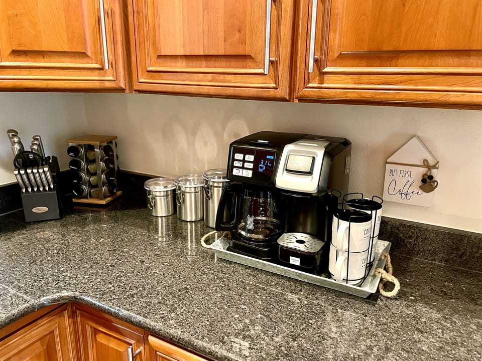 Main Cottage 
Single or 12 cup Carafe Hamilton Beach coffee maker provided coffee sugar creamer tea complimentary 