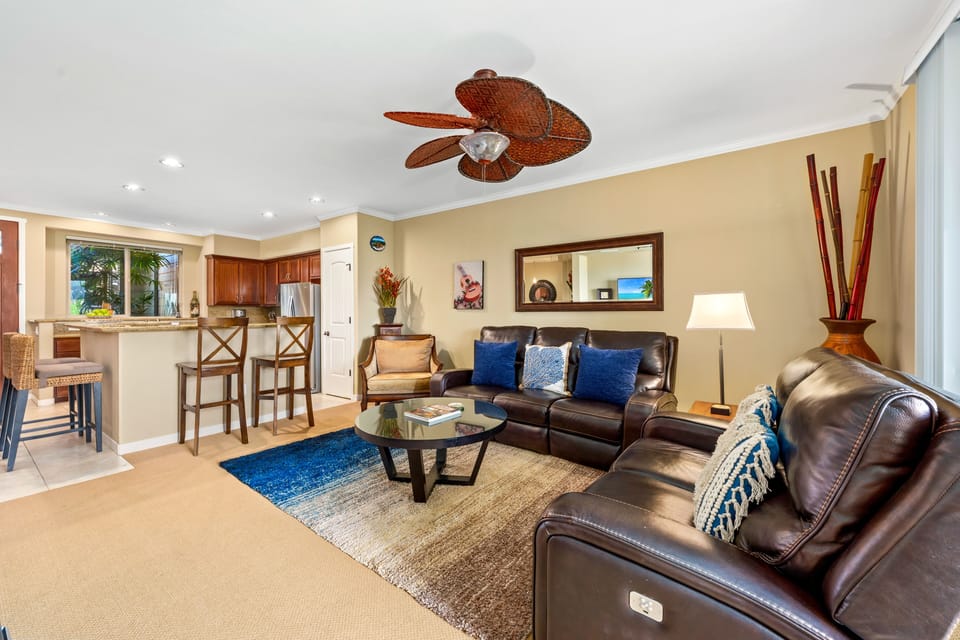 Open layout connects living room, kitchen and dining area