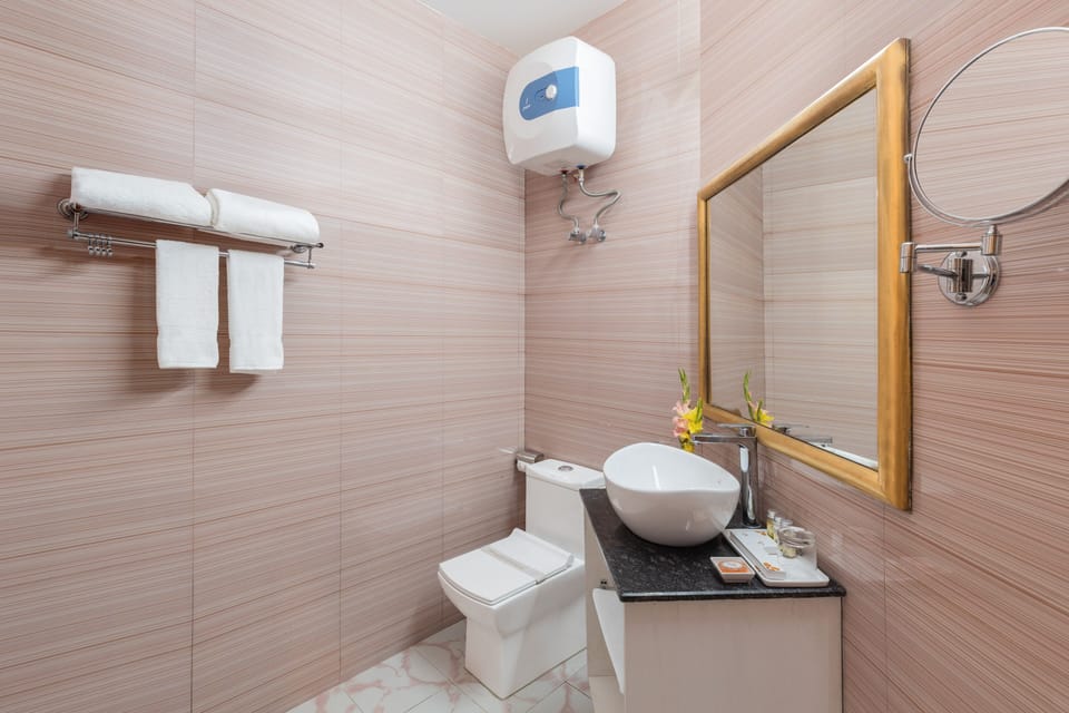 Shower, free toiletries, hair dryer, slippers