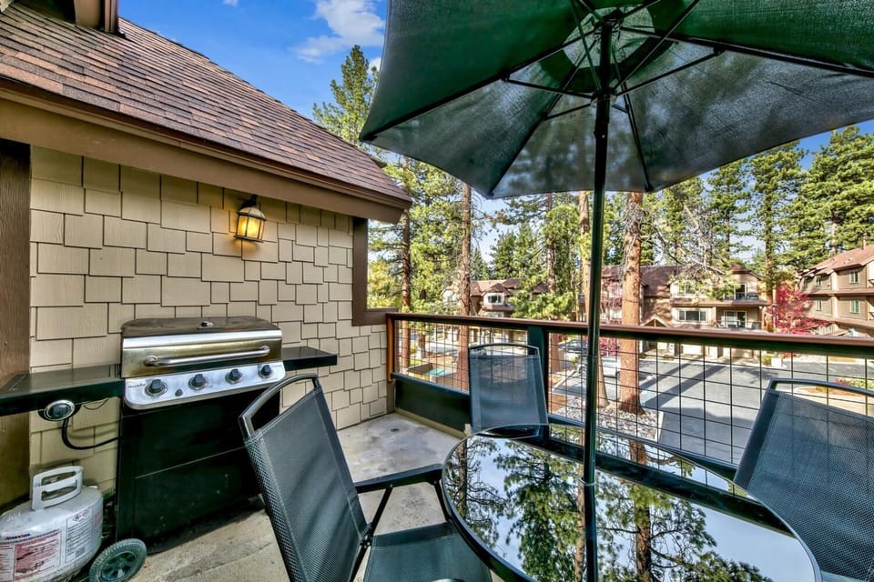 Fire up the grill on your private balcony while soaking in peaceful forest views through towering pines.