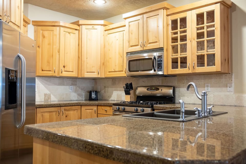 Granite countertops and wood cabinets