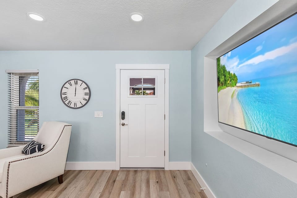 We have a massive, 75-inch TV, perfect for watching games and movies.