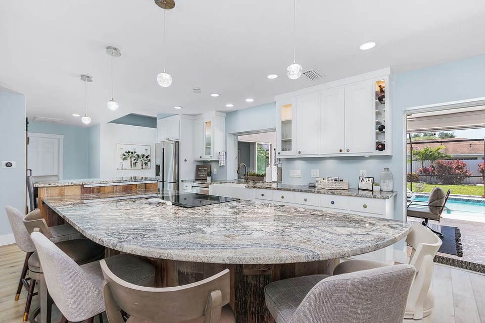 This large dining table for 8 looks inviting. One can imagine the fun conversations to be had over dinner in this spot.