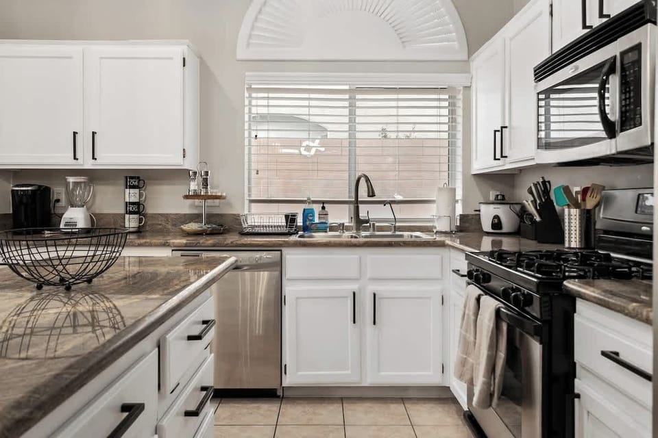 If you love cooking, you would appreciate our modern kitchen, complete with new stainless steel appliances and everything you need to prepare your delicious meals.