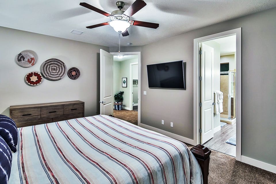 594 Master Bedroom, King Bed with Memory Foam Bed, and a Samsung 55" 4K TV