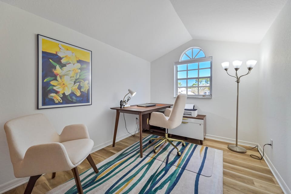 BRK4133 - The third bedroom with queen size bed and flat screen TV is located on the second floor, and is equipped with a large office nook with desk, monitor and printer.