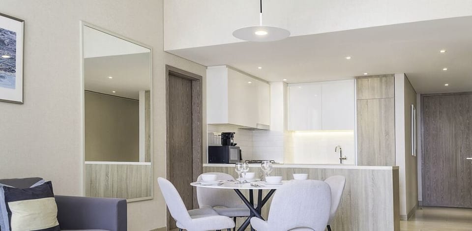 Deluxe Apartment | Living area | 55-inch Smart TV with cable channels, TV