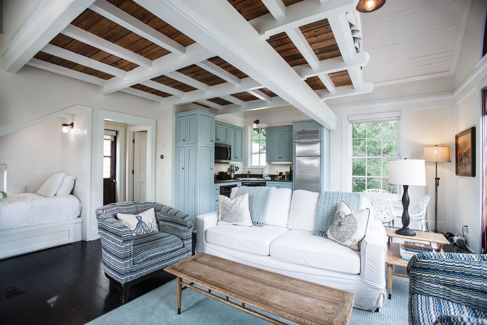 A queen-size sleeper sofa and built-in twin bed provide flexible