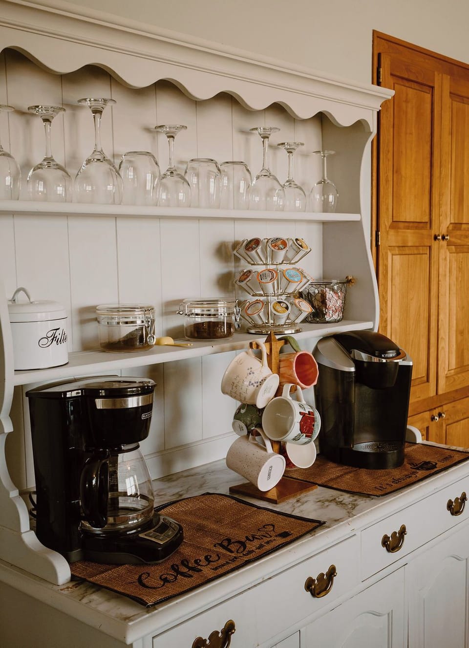 A fully stocked coffee bar with drip coffee as well as a Keurig. 