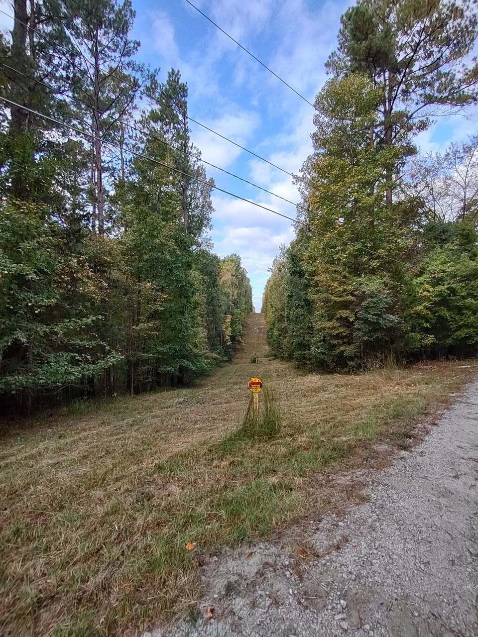 Walking trail and propane line bordering property. 
