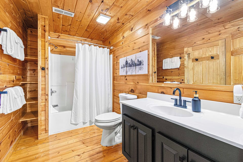 Upstairs bathroom attached to the king bedroom and access to the hallway.