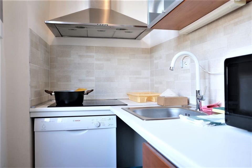Standard Apartment, 1 Bedroom | Private kitchen | Full-size fridge, microwave, dishwasher, coffee/tea maker