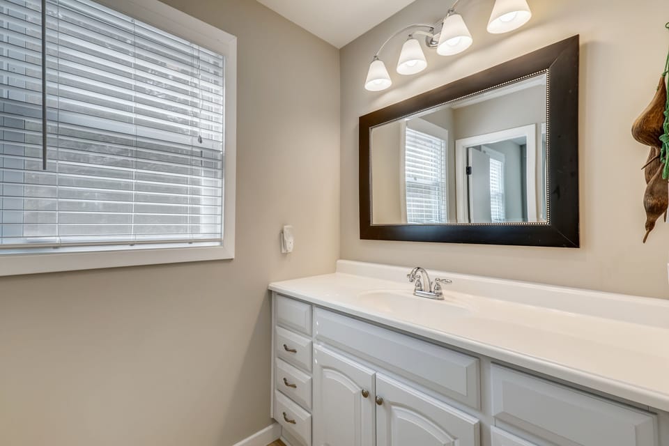 Second floor primary bathroom with bathtub/shower