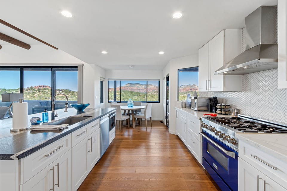 Stainless Appliances Including a 6-Burner Gas Range