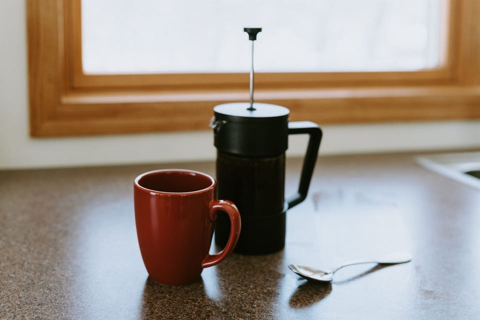 A burr grinder and french press for espresso style joe...