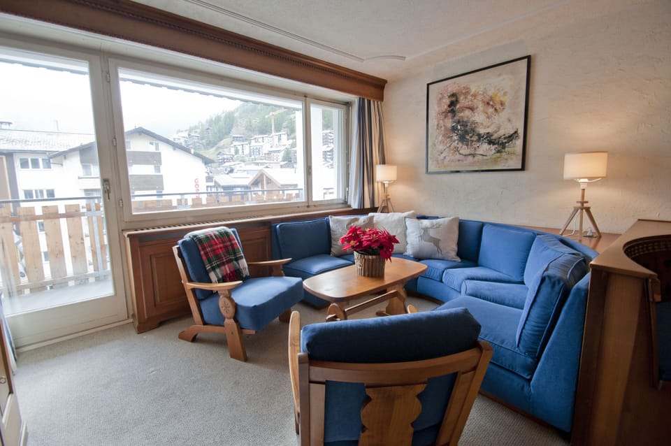 Apartment | Living area | 50-inch LED TV with cable channels, TV, DVD player