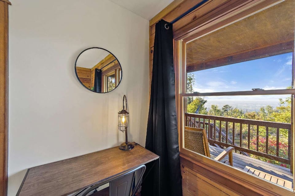 Bedroom #1: A desk to work from (if you must!) while enjoying the spectacular view