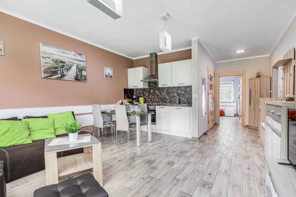 The harmonious combination of living area and kitchenette provides comfort and functionality.