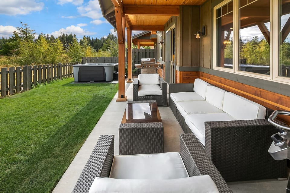 Zen Den: - Comfortable outdoor living space with a gas BBQ.