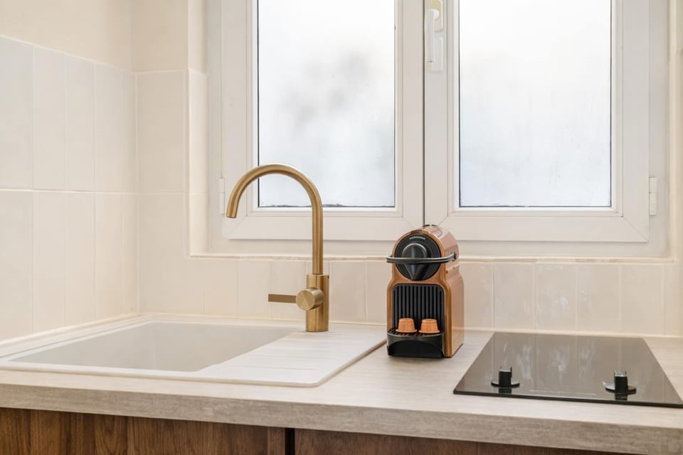 This bright, open kitchen comes well equipped, including a washer and a Nespresso machine.