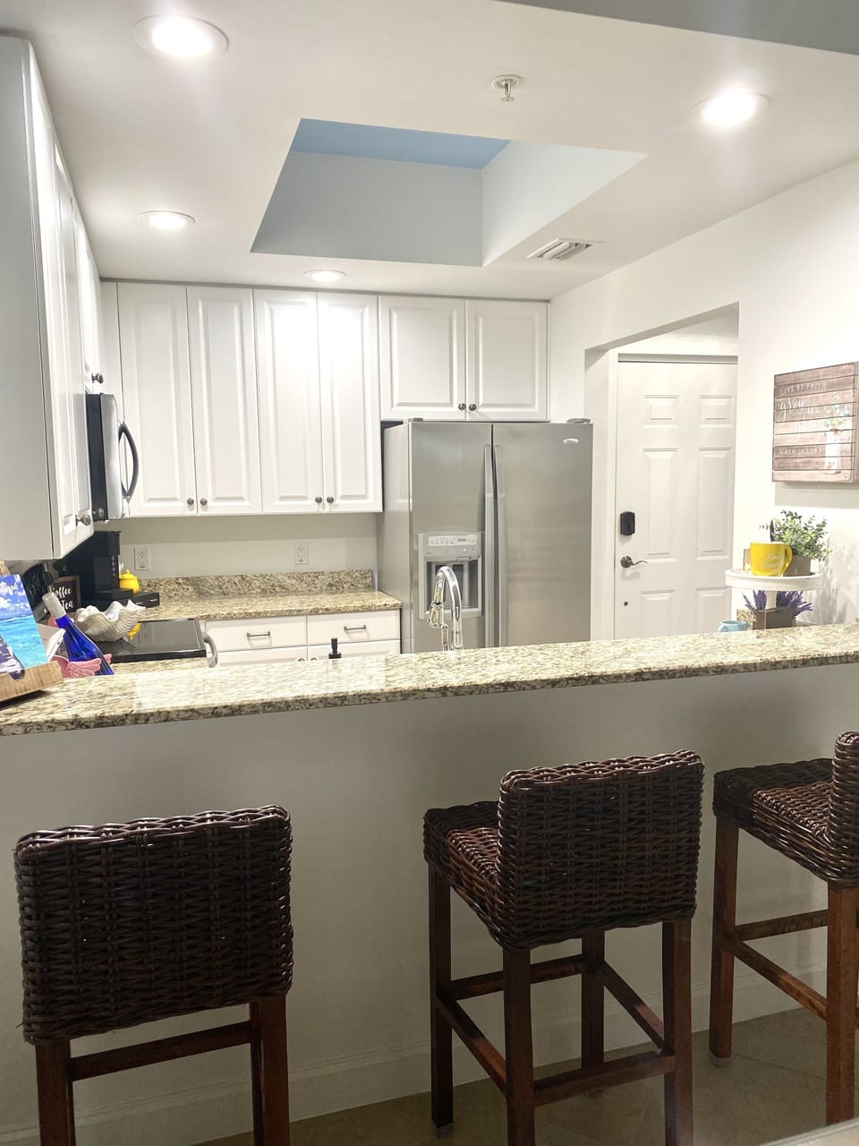 Fully equipped kitchen; stainless steel appliances.