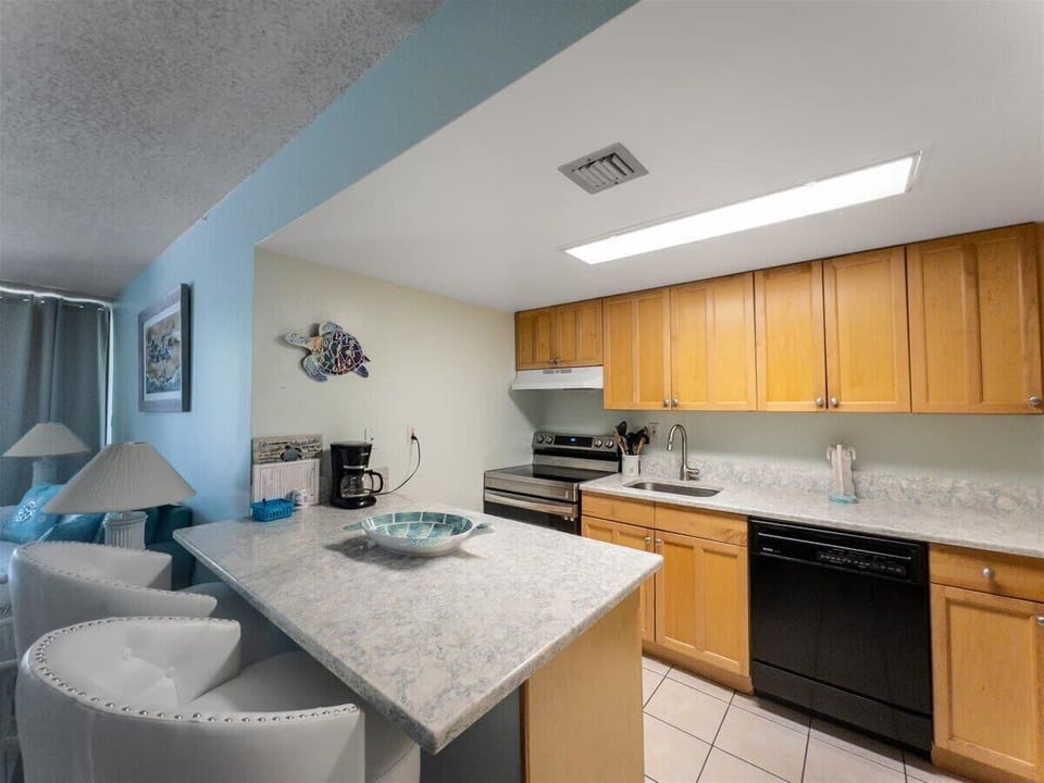 The well-equipped kitchen has everything you need to whip up delicious meals.
