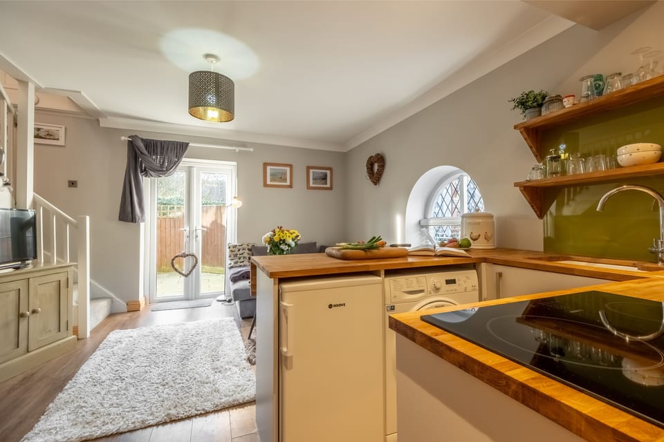 Ground floor: Open plan kitchen, sitting, dining area