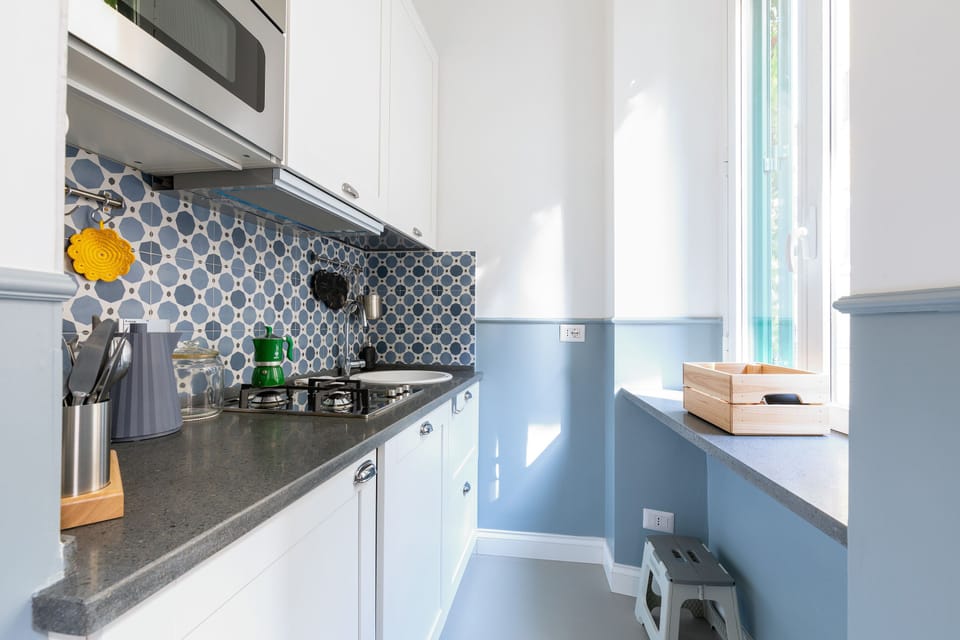 Design Apartment | Private kitchen | Fridge, stovetop, cookware/dishes/utensils, freezer