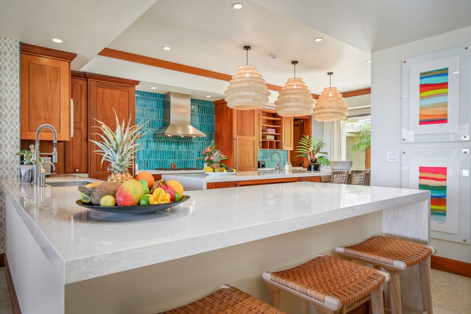 Top tier appliances throughout, this generous kitchen is the perfect hub for this flawless home.