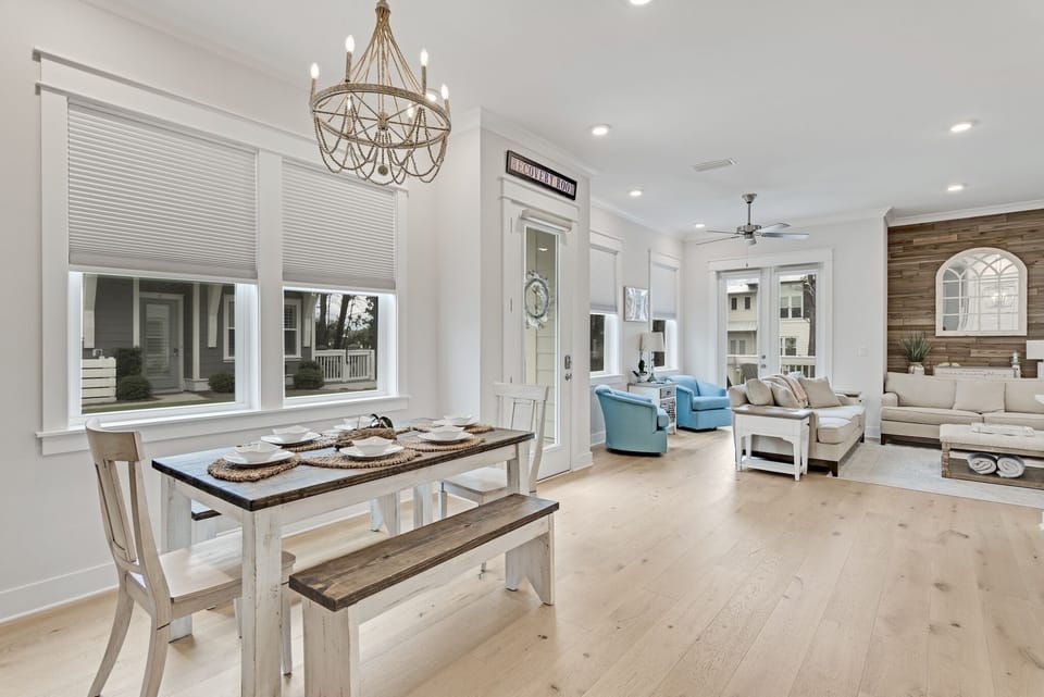 This open-plan living and dining area invites guests to dine, relax, and socialize.