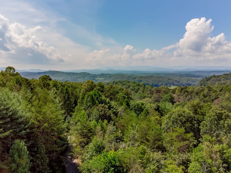 Spectacular long-range views from decks, porches, and inside the property