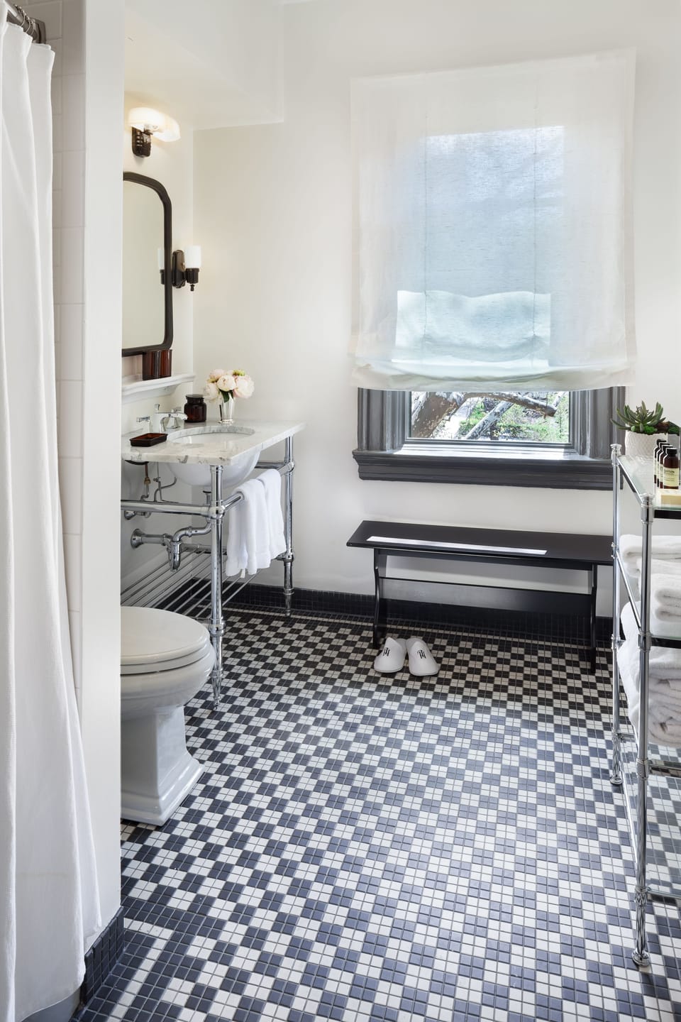 Combined shower/tub, designer toiletries, hair dryer, bathrobes