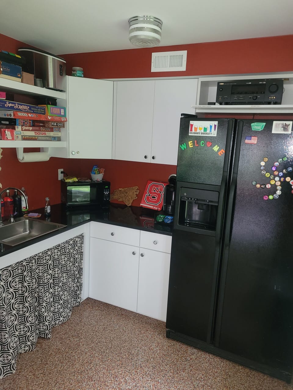 Kitchenette with coffee maker, toaster, microwave, freezer/fridge. No stove.